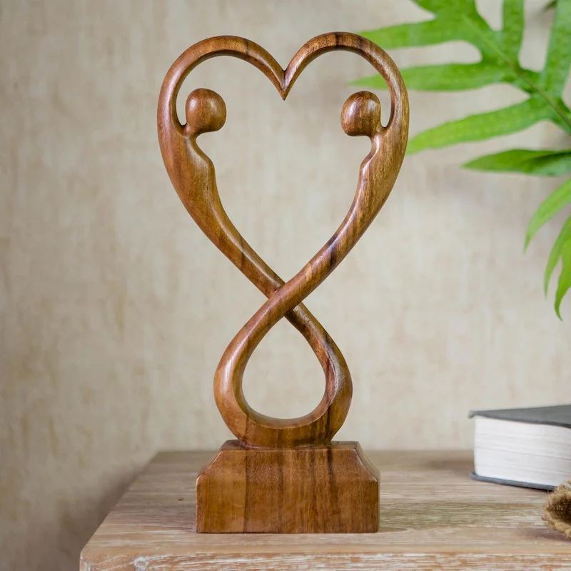 Novica Handmade Care And Protection Wood Statuette